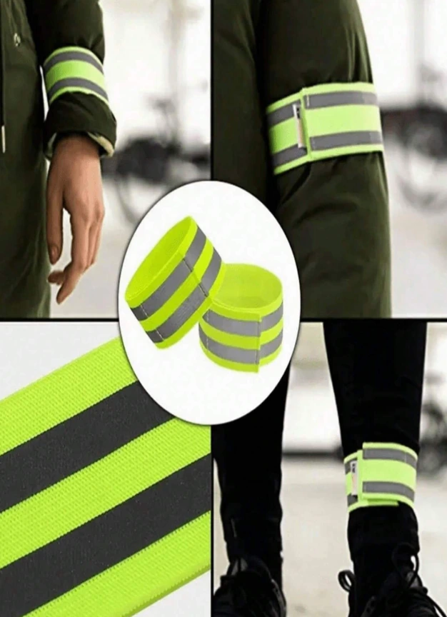 Brassard réfléchissant porté au bras, insuffisant pour remplacer un gilet de haute visibilité.